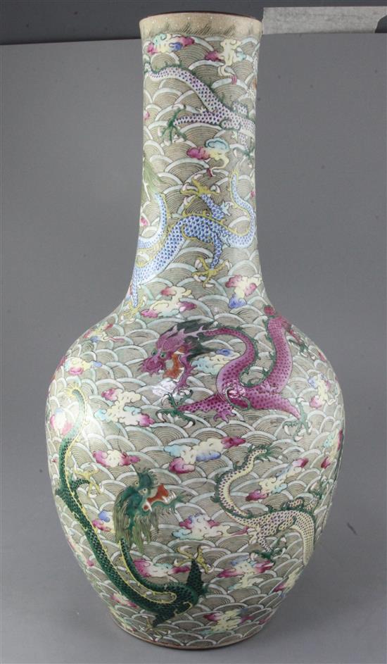 A large Chinese famille rose enamelled dragon bottle vase, late 19th century, height 54.5cm